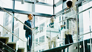 business-colleagues-discussion-stairs-691574673