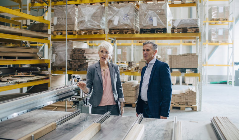 Business People Analyzing Wooden Samples