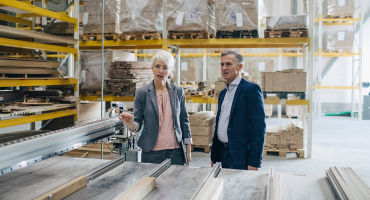 Business People Analyzing Wooden Samples
