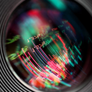 camera lens with candle sticks