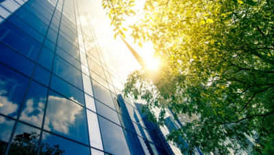 glass building under sunrise