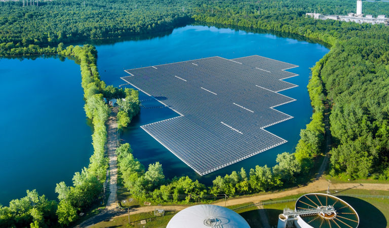 Aerial view of floating solar panels cell platform on the lake