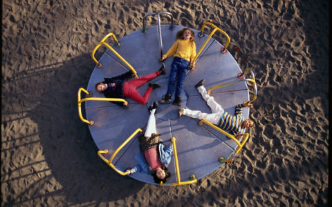 kids on roundabout gettyimages 523373338