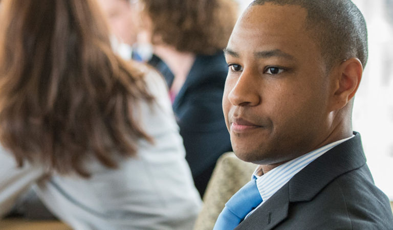man focused on meeting room