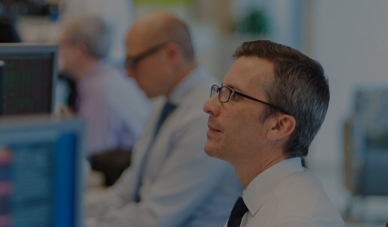 man-watching-monitor-1500x450