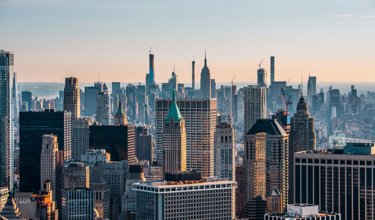 Helicopter view of the New York City skyline and the The Trump Building in Lower Manhattan, New York.