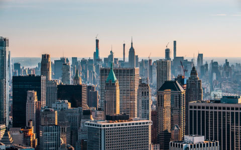 Helicopter view of the New York City skyline and the The Trump Building in Lower Manhattan, New York.