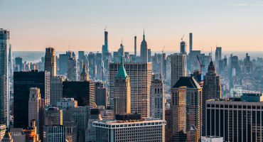 Helicopter view of the New York City skyline and the The Trump Building in Lower Manhattan, New York.