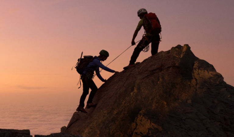 People are climbing rock