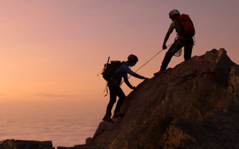 People are climbing rock