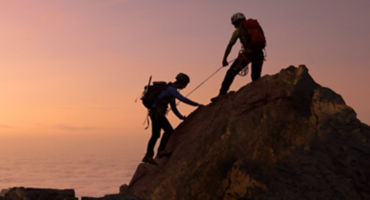 People are climbing rock