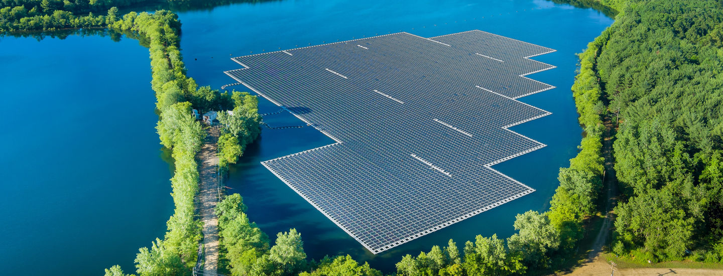 Aerial view of floating solar panels cell platform on the lake