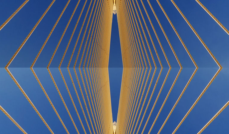 suspension-bridge-reflected-gold-1163186607