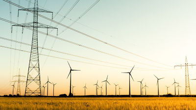 towers and windmill in the grass