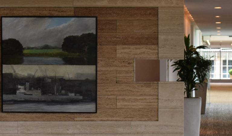 wall-with-paintings-1500x450
