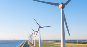 Wind mills on river bank