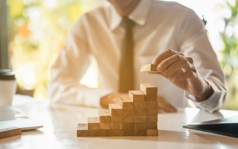 Placing wooden blocks