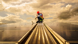 worker-solar-panel-1401941657